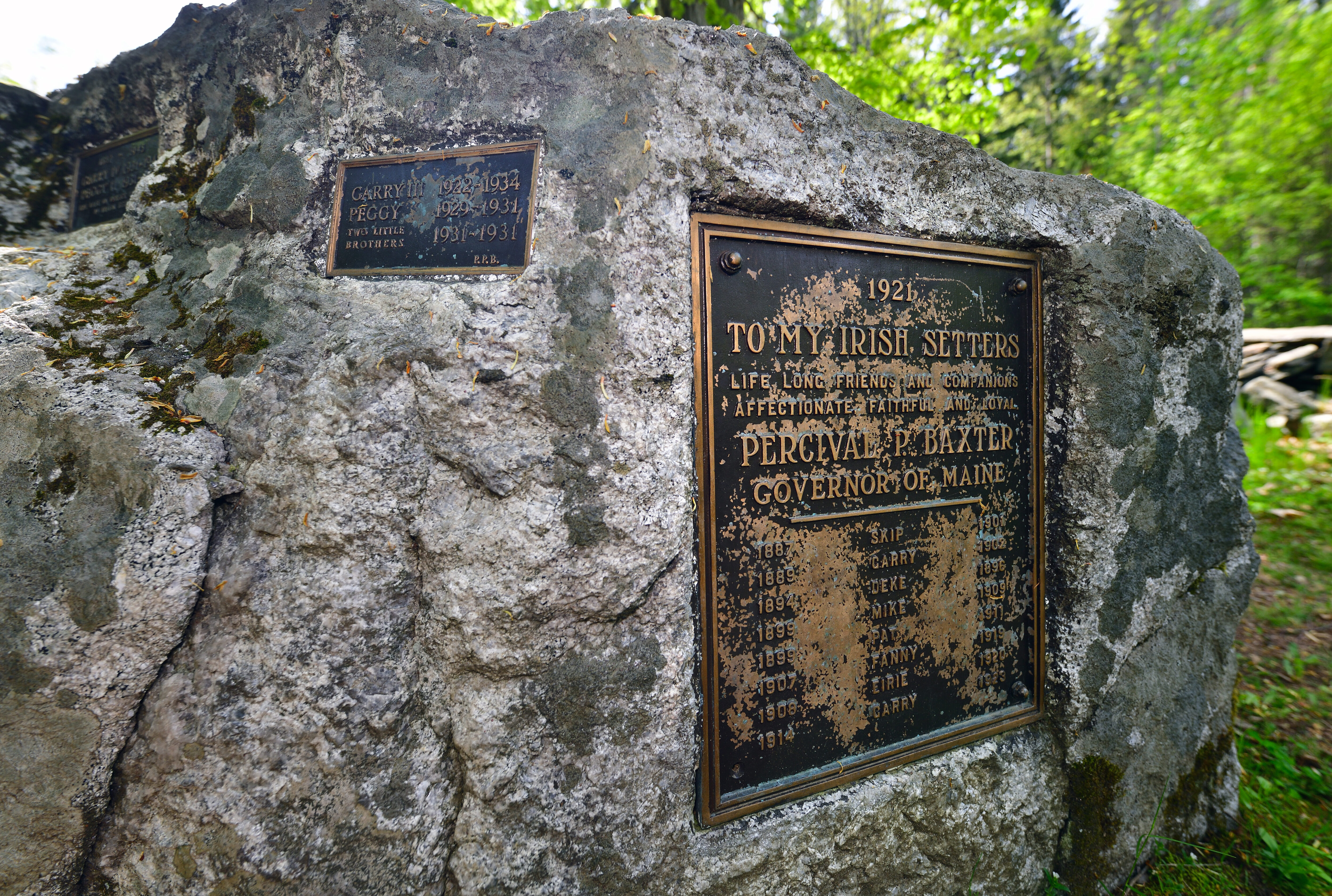 The stone memorial and bronze plaque