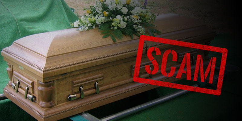 Partial photo of a casket with a flower arrangement on top. Red text over image says 